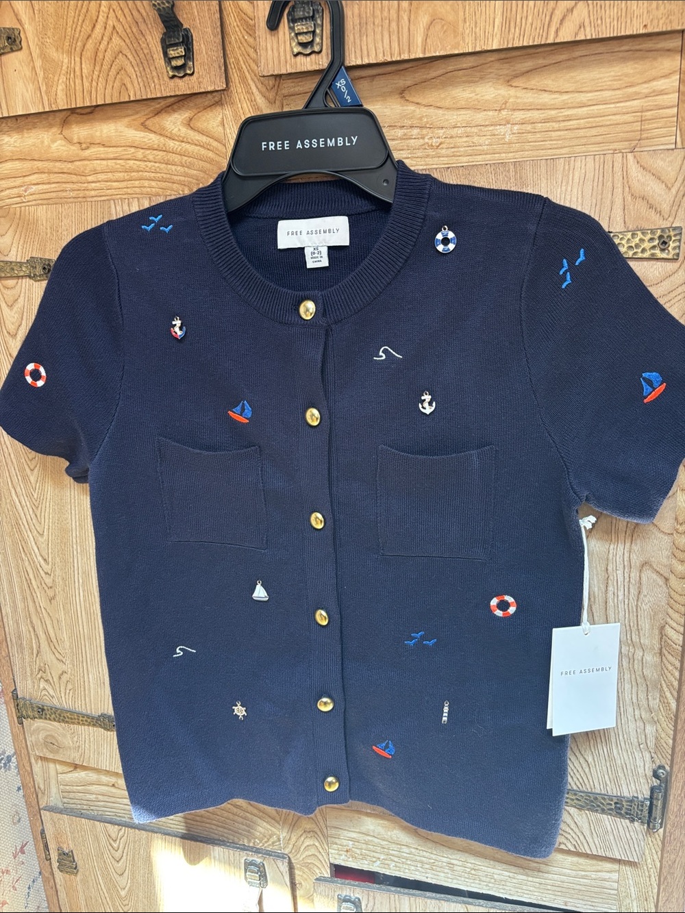 Navy embroidered cardigan nautical-themed charms and gold buttons Free Assembly
